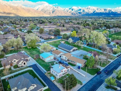 A quaint southwestern house set in a peaceful, quiet on Mick Riley Golf Course in Utah - for sale on GolfHomes.com, golf home, golf lot