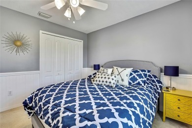 Commanding golf course views and elegant architectural details on Heritage Harbor Golf and Country Club in Florida - for sale on GolfHomes.com, golf home, golf lot