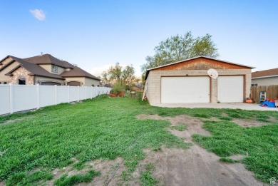 A quaint southwestern house set in a peaceful, quiet on Mick Riley Golf Course in Utah - for sale on GolfHomes.com, golf home, golf lot