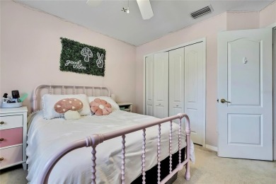 Commanding golf course views and elegant architectural details on Heritage Harbor Golf and Country Club in Florida - for sale on GolfHomes.com, golf home, golf lot