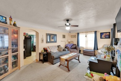 A quaint southwestern house set in a peaceful, quiet on Mick Riley Golf Course in Utah - for sale on GolfHomes.com, golf home, golf lot