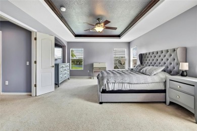 Commanding golf course views and elegant architectural details on Heritage Harbor Golf and Country Club in Florida - for sale on GolfHomes.com, golf home, golf lot