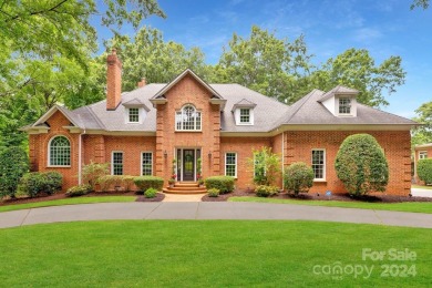 This exquisite brick residence located in Providence Country on Providence Country Club in North Carolina - for sale on GolfHomes.com, golf home, golf lot