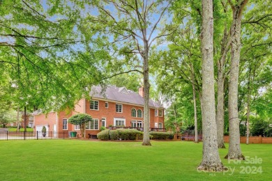 This exquisite brick residence located in Providence Country on Providence Country Club in North Carolina - for sale on GolfHomes.com, golf home, golf lot