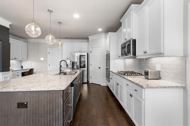 Welcome to luxury living in the gated Crystal Lake community-one on Crystal Lake Golf and Country Club in Georgia - for sale on GolfHomes.com, golf home, golf lot