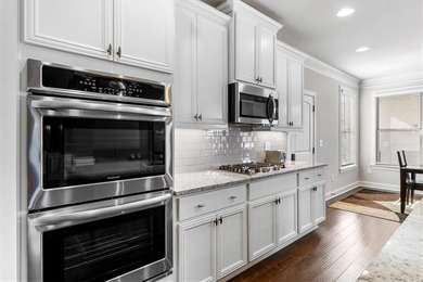 Welcome to luxury living in the gated Crystal Lake community-one on Crystal Lake Golf and Country Club in Georgia - for sale on GolfHomes.com, golf home, golf lot