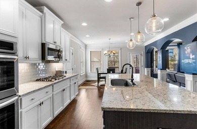 Welcome to luxury living in the gated Crystal Lake community-one on Crystal Lake Golf and Country Club in Georgia - for sale on GolfHomes.com, golf home, golf lot