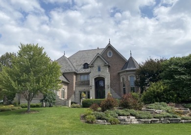 This exquisite custom beauty can be found in the gorgeous on Woodstock Country Club in Illinois - for sale on GolfHomes.com, golf home, golf lot