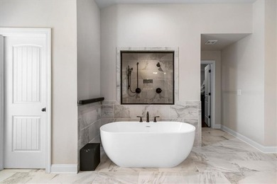 Welcome to luxury living in the gated Crystal Lake community-one on Crystal Lake Golf and Country Club in Georgia - for sale on GolfHomes.com, golf home, golf lot