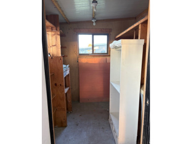 Very spacious canal front two bedroom, two bath home with a on Golden Lakes Golf Course in Florida - for sale on GolfHomes.com, golf home, golf lot