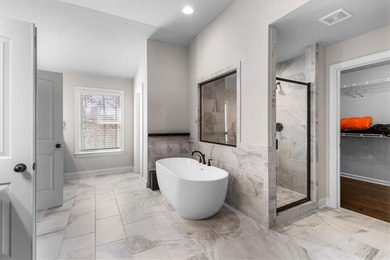 Welcome to luxury living in the gated Crystal Lake community-one on Crystal Lake Golf and Country Club in Georgia - for sale on GolfHomes.com, golf home, golf lot