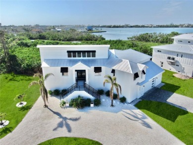 No detail has been spared in creating this 2023 Custom-Built on Lemon Bay Golf Club in Florida - for sale on GolfHomes.com, golf home, golf lot