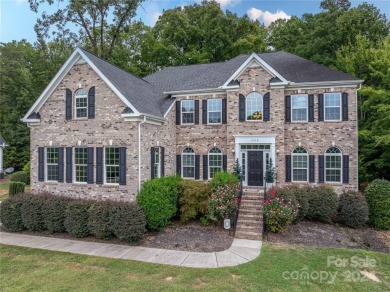 Lake living is calling you! This beautiful full brick stately on Westport Golf Club in North Carolina - for sale on GolfHomes.com, golf home, golf lot