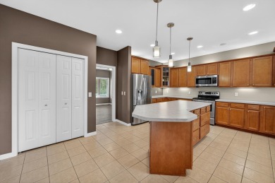 Welcome home to this sprawling 4BR/3.5BA home in Oregon's finest on The Legend At Bergamont in Wisconsin - for sale on GolfHomes.com, golf home, golf lot