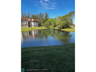 Welcome home to this well kept move-in ready furnished 1st floor on Sunrise Lakes Phase III in Florida - for sale on GolfHomes.com, golf home, golf lot