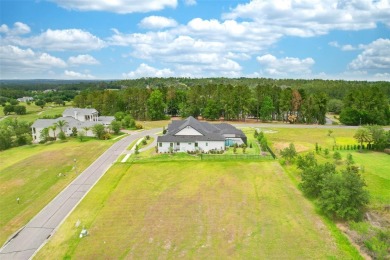 This double lot is a vacant residential lot located within the on Southern Hills Plantation Club in Florida - for sale on GolfHomes.com, golf home, golf lot