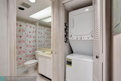 SALE OF THE CENTURY IN VIBRANT & HIGHLY SOUGHT AFTER WYNMOOR! on Wynmoor Golf Course in Florida - for sale on GolfHomes.com, golf home, golf lot