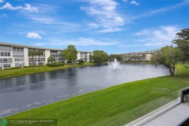 SALE OF THE CENTURY IN VIBRANT & HIGHLY SOUGHT AFTER WYNMOOR! on Wynmoor Golf Course in Florida - for sale on GolfHomes.com, golf home, golf lot