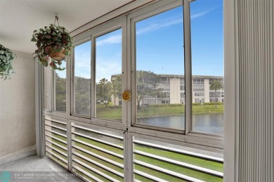 SALE OF THE CENTURY IN VIBRANT & HIGHLY SOUGHT AFTER WYNMOOR! on Wynmoor Golf Course in Florida - for sale on GolfHomes.com, golf home, golf lot