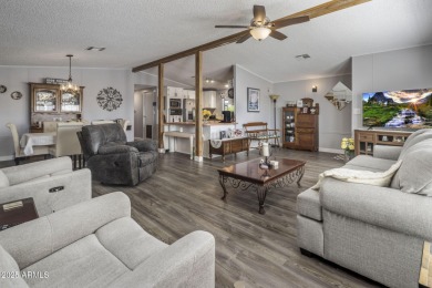 Enjoy the best of Arizona living in this updated 2-bedroom on Fountain of the Sun Country Club in Arizona - for sale on GolfHomes.com, golf home, golf lot