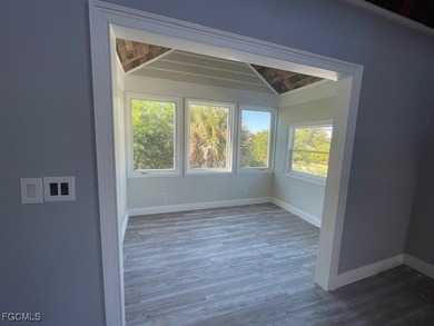 TROPICAL ISLAND RETREAT - 4 BEDROOMS - 3 BATHROOMS POOL HOME on Alden Pines Golf Club in Florida - for sale on GolfHomes.com, golf home, golf lot