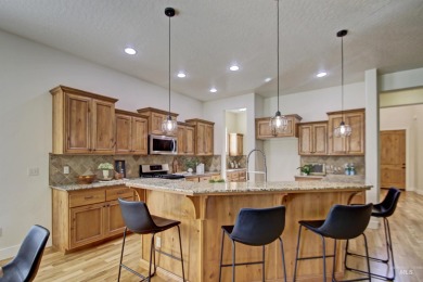 This fantastic Legacy home offering 5 oversized bedrooms and 3.5 on Eagle Legacy Golf Course in Idaho - for sale on GolfHomes.com, golf home, golf lot