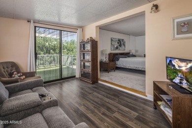 Enjoy the best of Arizona living in this updated 2-bedroom on Fountain of the Sun Country Club in Arizona - for sale on GolfHomes.com, golf home, golf lot