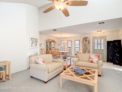 Welcome to your dream home in Whispering Oaks, where comfort on The Ridge Manor Oaks Golf and Country Club in Florida - for sale on GolfHomes.com, golf home, golf lot