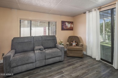 Enjoy the best of Arizona living in this updated 2-bedroom on Fountain of the Sun Country Club in Arizona - for sale on GolfHomes.com, golf home, golf lot