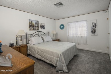Enjoy the best of Arizona living in this updated 2-bedroom on Fountain of the Sun Country Club in Arizona - for sale on GolfHomes.com, golf home, golf lot