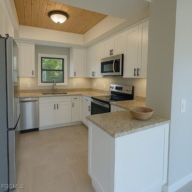 TROPICAL ISLAND RETREAT - 4 BEDROOMS - 3 BATHROOMS POOL HOME on Alden Pines Golf Club in Florida - for sale on GolfHomes.com, golf home, golf lot