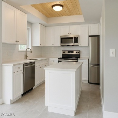 TROPICAL ISLAND RETREAT - 4 BEDROOMS - 3 BATHROOMS POOL HOME on Alden Pines Golf Club in Florida - for sale on GolfHomes.com, golf home, golf lot