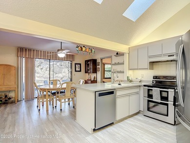 Welcome to your dream home in Whispering Oaks, where comfort on The Ridge Manor Oaks Golf and Country Club in Florida - for sale on GolfHomes.com, golf home, golf lot