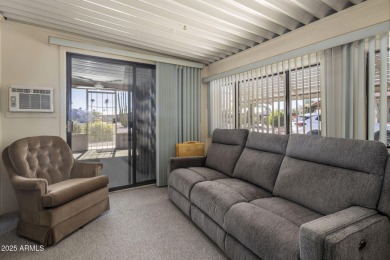 Enjoy the best of Arizona living in this updated 2-bedroom on Fountain of the Sun Country Club in Arizona - for sale on GolfHomes.com, golf home, golf lot