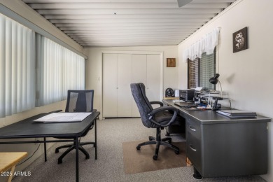 Enjoy the best of Arizona living in this updated 2-bedroom on Fountain of the Sun Country Club in Arizona - for sale on GolfHomes.com, golf home, golf lot