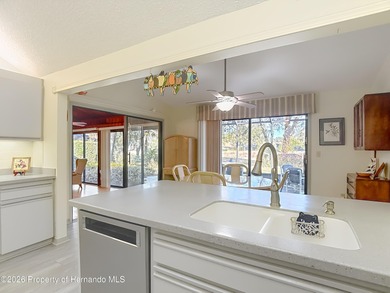 Welcome to your dream home in Whispering Oaks, where comfort on The Ridge Manor Oaks Golf and Country Club in Florida - for sale on GolfHomes.com, golf home, golf lot