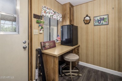 Enjoy the best of Arizona living in this updated 2-bedroom on Fountain of the Sun Country Club in Arizona - for sale on GolfHomes.com, golf home, golf lot