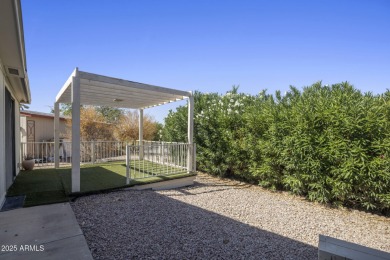 Enjoy the best of Arizona living in this updated 2-bedroom on Fountain of the Sun Country Club in Arizona - for sale on GolfHomes.com, golf home, golf lot