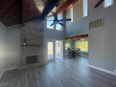 TROPICAL ISLAND RETREAT - 4 BEDROOMS - 3 BATHROOMS POOL HOME on Alden Pines Golf Club in Florida - for sale on GolfHomes.com, golf home, golf lot