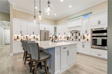 This 2023-built home in the highly sought-after Bent Pine golf on Bent Pine Golf Club in Florida - for sale on GolfHomes.com, golf home, golf lot