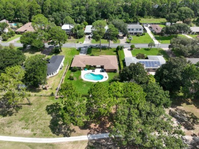 Amazing Neighborhood! Brick 4 Bedroom 2.5 Bath Golf Course Home on Shalimar Pointe Golf and Country Club in Florida - for sale on GolfHomes.com, golf home, golf lot
