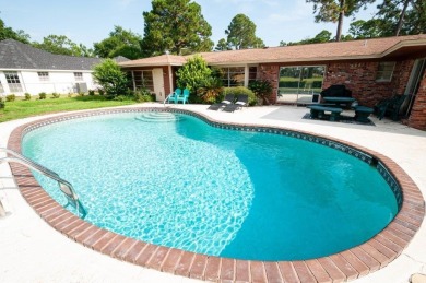 Amazing Neighborhood! Brick 4 Bedroom 2.5 Bath Golf Course Home on Shalimar Pointe Golf and Country Club in Florida - for sale on GolfHomes.com, golf home, golf lot