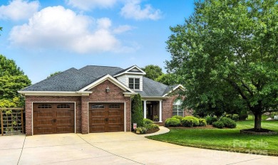 Stunning executive brick home in the gated Rock Barn Golf on Rock Barn Golf and Spa in North Carolina - for sale on GolfHomes.com, golf home, golf lot