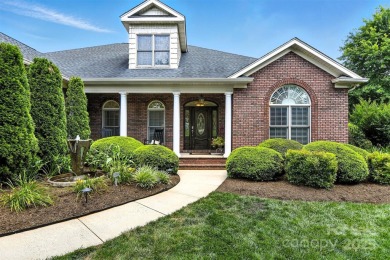 Stunning executive brick home in the gated Rock Barn Golf on Rock Barn Golf and Spa in North Carolina - for sale on GolfHomes.com, golf home, golf lot