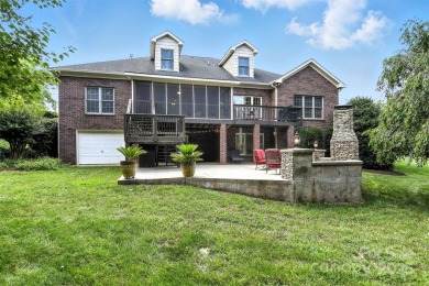 Stunning executive brick home in the gated Rock Barn Golf on Rock Barn Golf and Spa in North Carolina - for sale on GolfHomes.com, golf home, golf lot