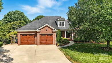Stunning executive brick home in the gated Rock Barn Golf on Rock Barn Golf and Spa in North Carolina - for sale on GolfHomes.com, golf home, golf lot