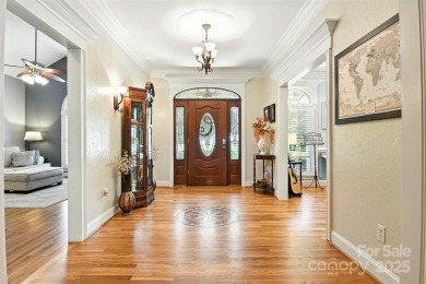 Stunning executive brick home in the gated Rock Barn Golf on Rock Barn Golf and Spa in North Carolina - for sale on GolfHomes.com, golf home, golf lot