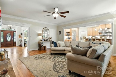Stunning executive brick home in the gated Rock Barn Golf on Rock Barn Golf and Spa in North Carolina - for sale on GolfHomes.com, golf home, golf lot