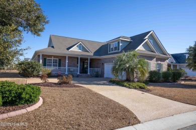 This beautifully maintained, custom canal-front home in on Magnolia Greens Golf Plantation in North Carolina - for sale on GolfHomes.com, golf home, golf lot