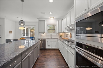 Located inside the gated golf course community of Anderson Creek on Anderson Creek Golf Club in North Carolina - for sale on GolfHomes.com, golf home, golf lot